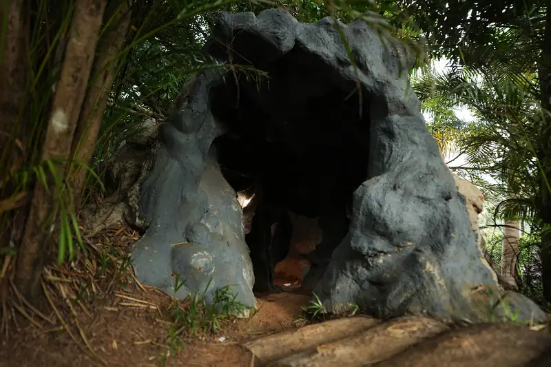 Sculpted rock cave in the gardens of Purayil Resort